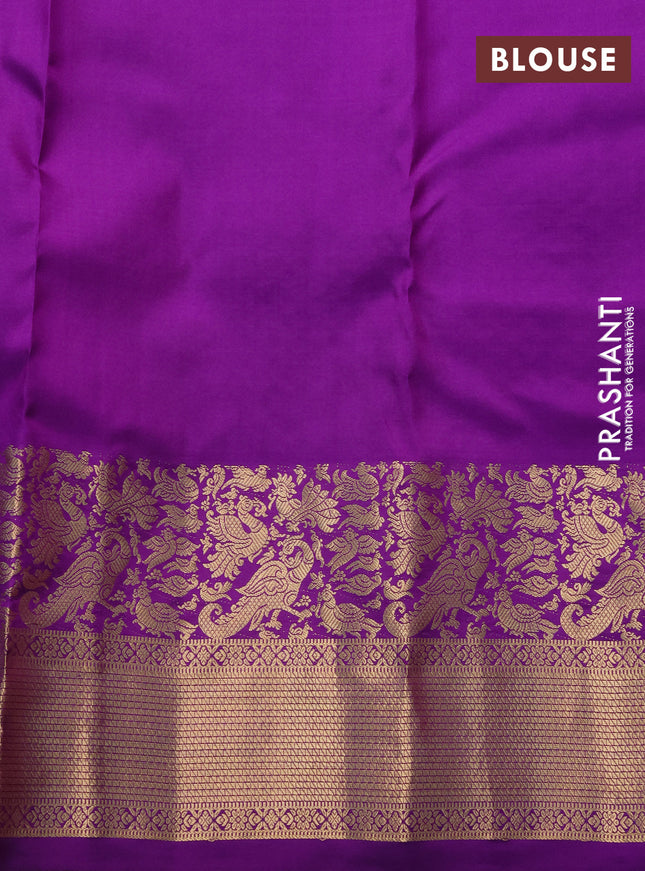 Pure kanchipuram silk saree peach pink and violet with allover zari woven buttas and rich zari woven border