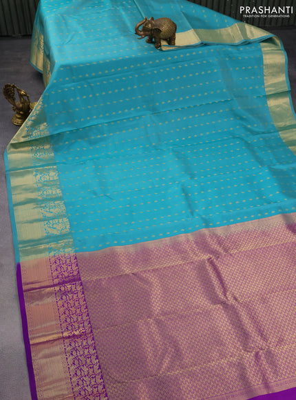 Pure kanchipuram silk saree teal blue and violet with allover zari woven buttas and rich zari woven border