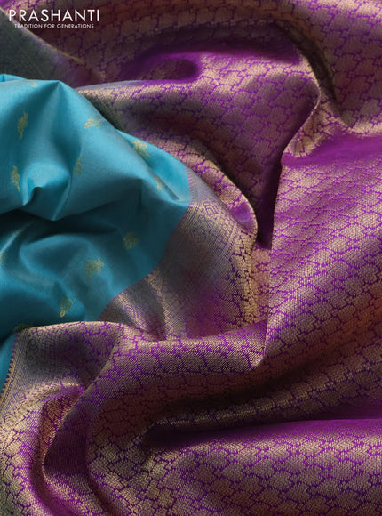 Pure kanchipuram silk saree teal blue and violet with allover zari woven buttas and rich zari woven border