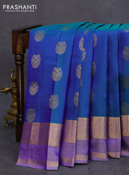 Pure kanchipuram silk saree dual shade of bluish green and lavender with annam zari woven buttas and zari woven border