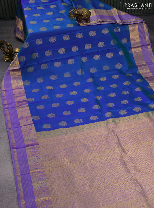 Pure kanchipuram silk saree dual shade of bluish green and lavender with annam zari woven buttas and zari woven border