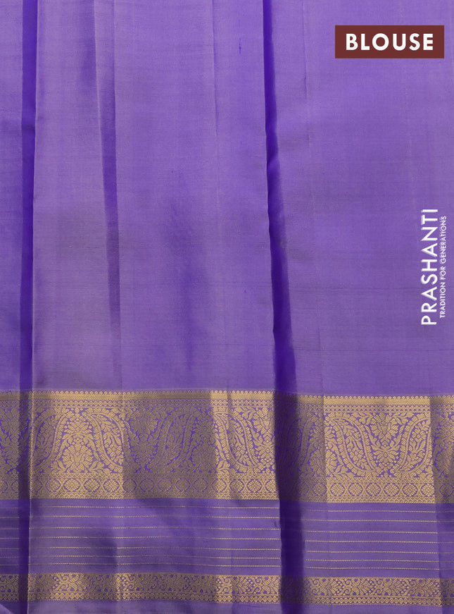Pure kanchipuram silk saree dual shade of bluish green and lavender with annam zari woven buttas and zari woven border
