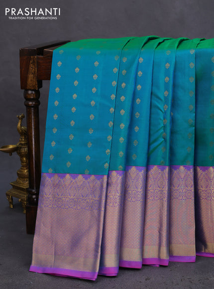 Pure kanchipuram silk saree dual shade of teal green and purple with zari woven buttas and zari woven border