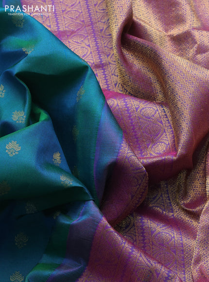 Pure kanchipuram silk saree dual shade of teal green and purple with zari woven buttas and zari woven border