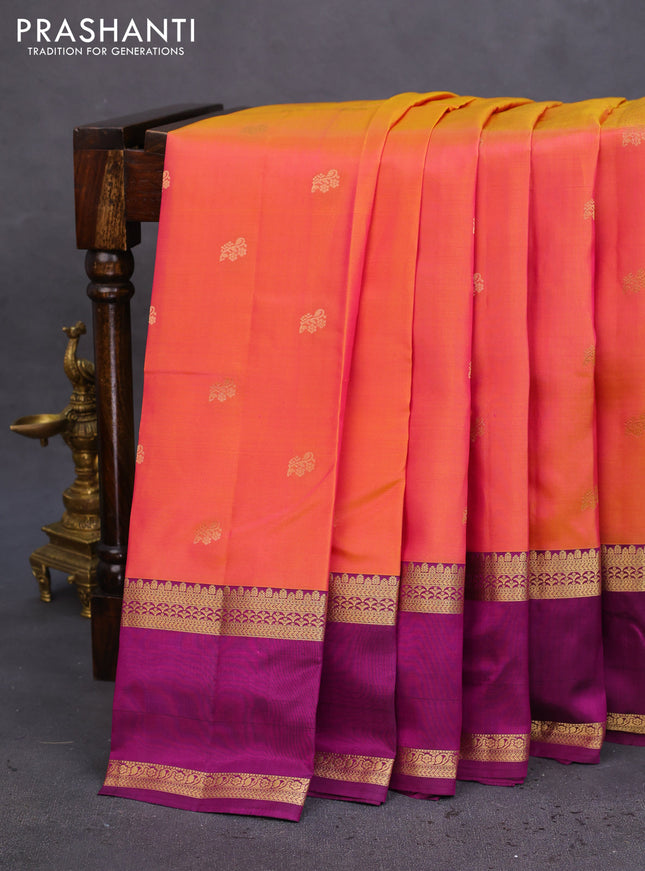 Pure kanchipuram silk saree dual shade of pinkish orange and purple with zari woven buttas and rettapet zari woven border