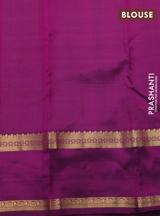 Pure kanchipuram silk saree dual shade of pinkish orange and purple with zari woven buttas and rettapet zari woven border