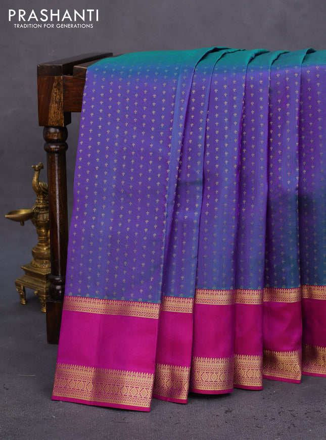 Pure kanchipuram silk saree dual shade of teal green and purple with allover zari woven 1000 buttas and rettapet zari woven border
