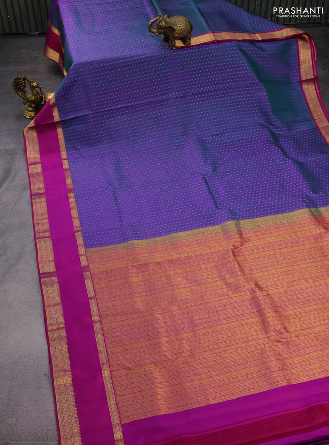 Pure kanchipuram silk saree dual shade of teal green and purple with allover zari woven 1000 buttas and rettapet zari woven border
