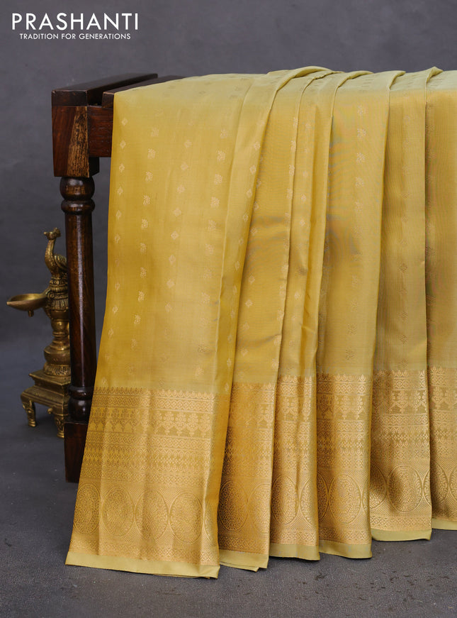 Pure kanchipuram silk saree pale yellow and violet with zari woven buttas and zari woven border
