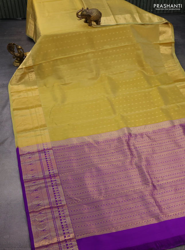 Pure kanchipuram silk saree pale yellow and violet with zari woven buttas and zari woven border