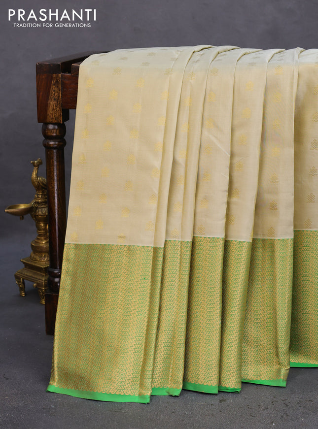 Pure kanchipuram silk saree cream and green with zari woven buttas and zari woven border