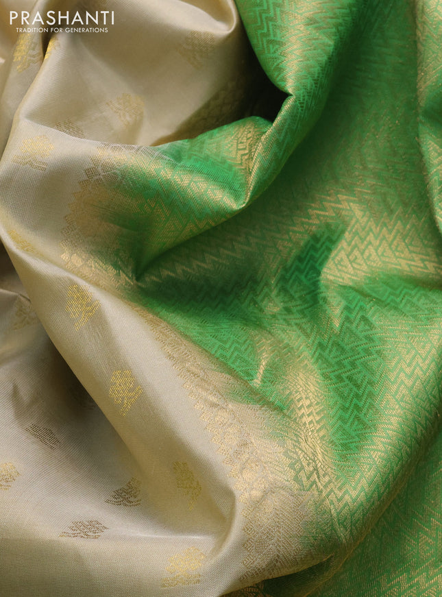 Pure kanchipuram silk saree cream and green with zari woven buttas and zari woven border