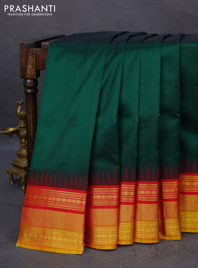 Kuppadam silk cotton saree bottle green and red mustard yellow with plain body and temple design zari woven border