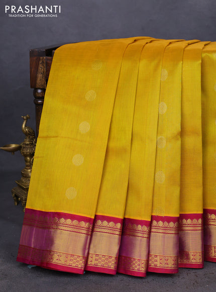 Kuppadam silk cotton saree yellow and purple with zari woven rudhraksha buttas and zari woven border