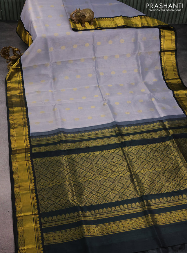 Kuppadam silk cotton saree grey and dark bottle green with zari woven rudhraksha buttas and zari woven border