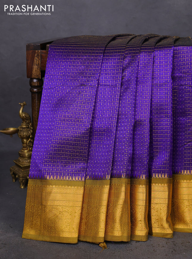 Kuppadam silk cotton saree blue and mustard green with allover lakshadeepam weaves and zari woven border