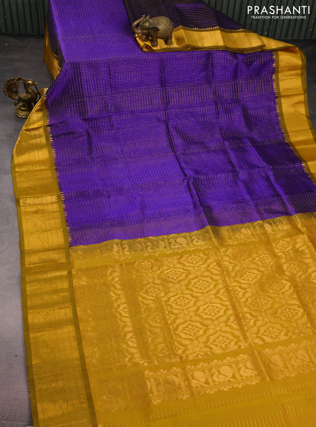 Kuppadam silk cotton saree blue and mustard green with allover lakshadeepam weaves and zari woven border