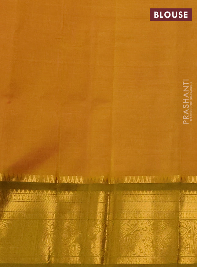 Kuppadam silk cotton saree light pink and mustard green with allover lakshadeepam weaves and zari woven border
