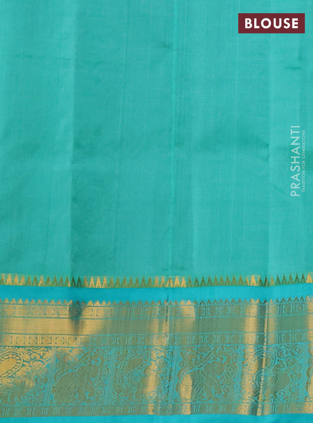 Kuppadam silk cotton saree grey and teal blue shade with allover lakshadeepam weaves and zari woven border