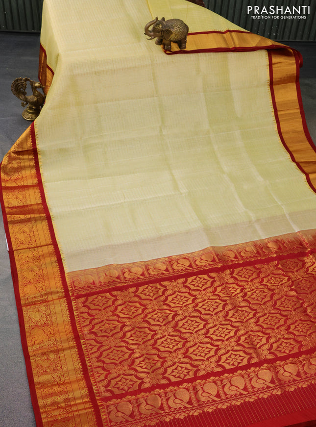Kuppadam silk cotton saree cream and maroon with allover lakshadeepam weaves and zari woven border