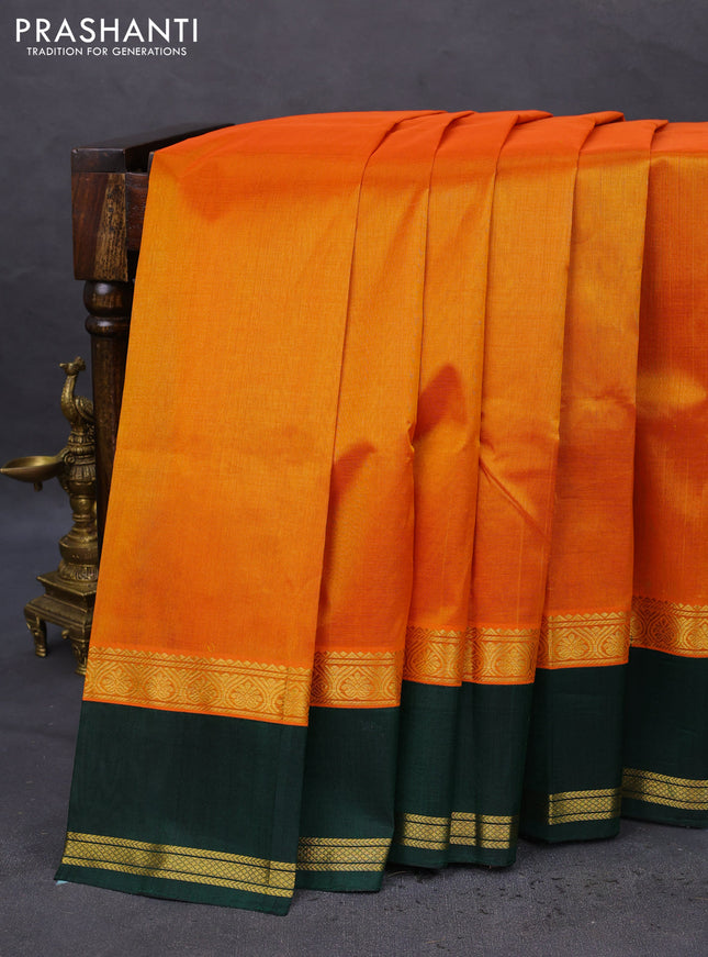 Kuppadam silk cotton saree dual shade of mango yellow and bottle green with plain body and rettapet zari woven border