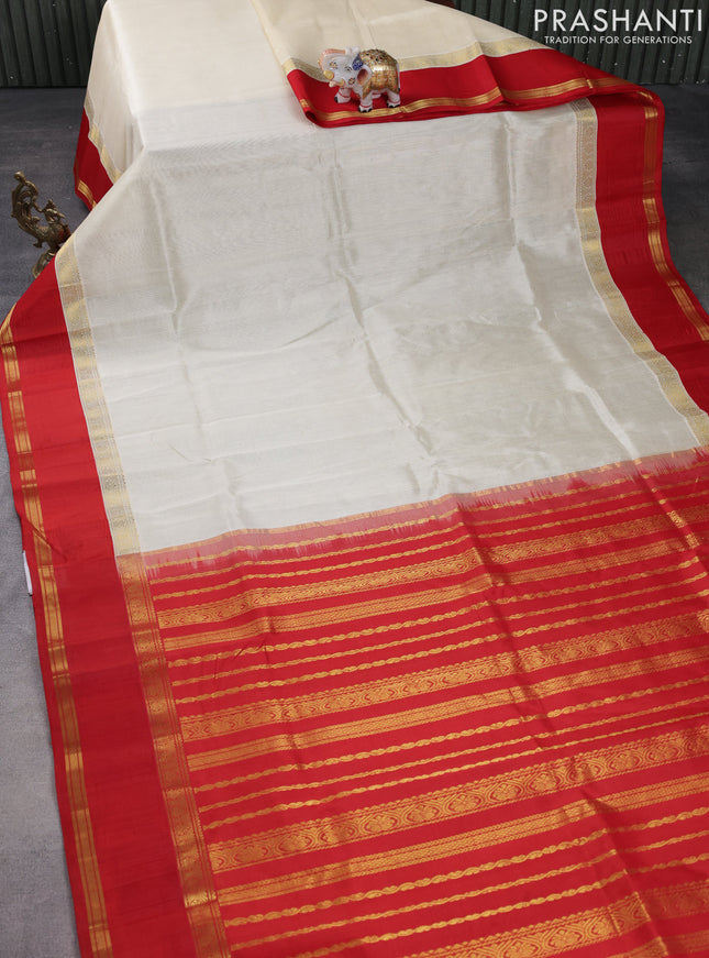 Kuppadam silk cotton saree cream and red with plain body and rettapet zari woven border