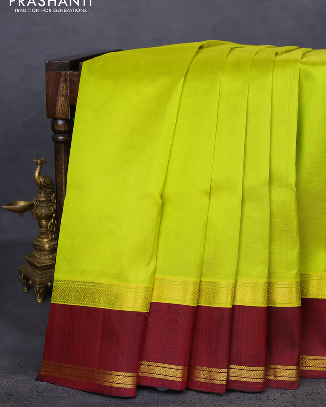 Kuppadam silk cotton saree lime yellow and deep maroon with plain body and rettapet zari woven border