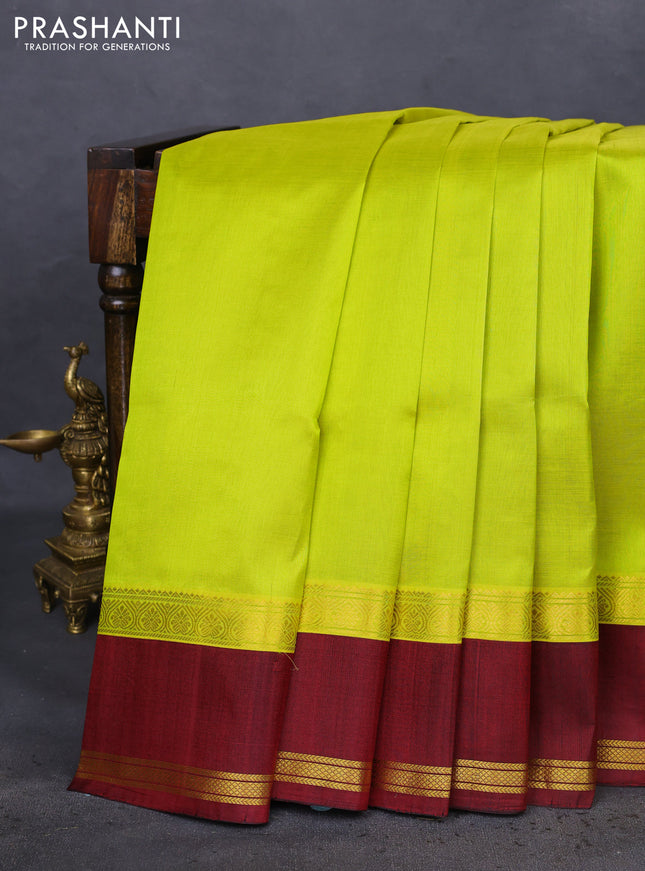 Kuppadam silk cotton saree lime yellow and deep maroon with plain body and rettapet zari woven border