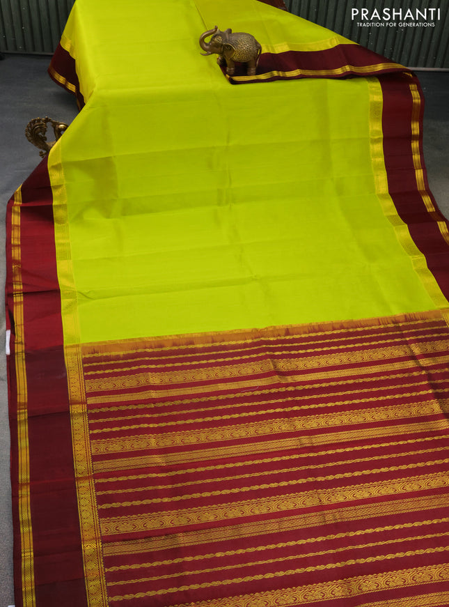 Kuppadam silk cotton saree lime yellow and deep maroon with plain body and rettapet zari woven border