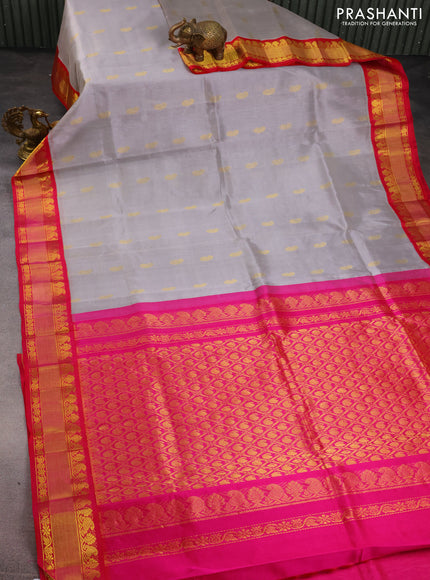 Kuppadam silk cotton saree pastel grey and pink with paisley zari woven buttas and zari woven border