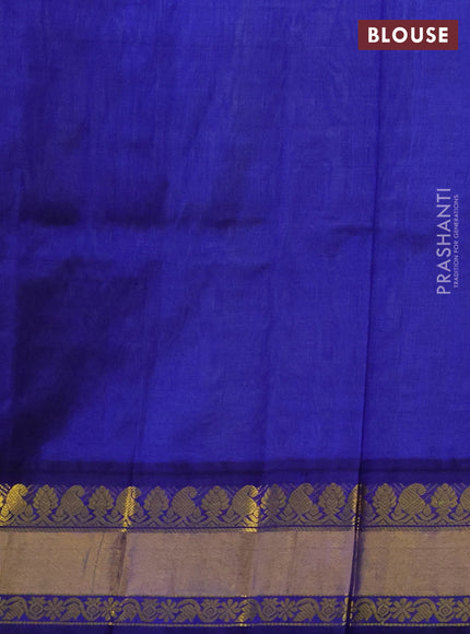 Kuppadam silk cotton saree light green and blue with paisley zari woven buttas and zari woven border