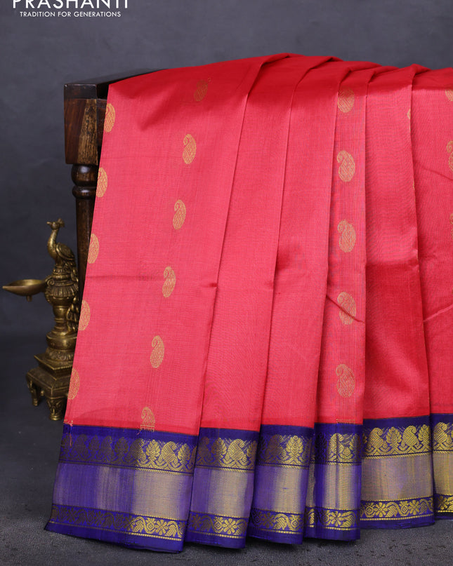 Kuppadam silk cotton saree tomato red and blue with paisley zari woven buttas and zari woven border