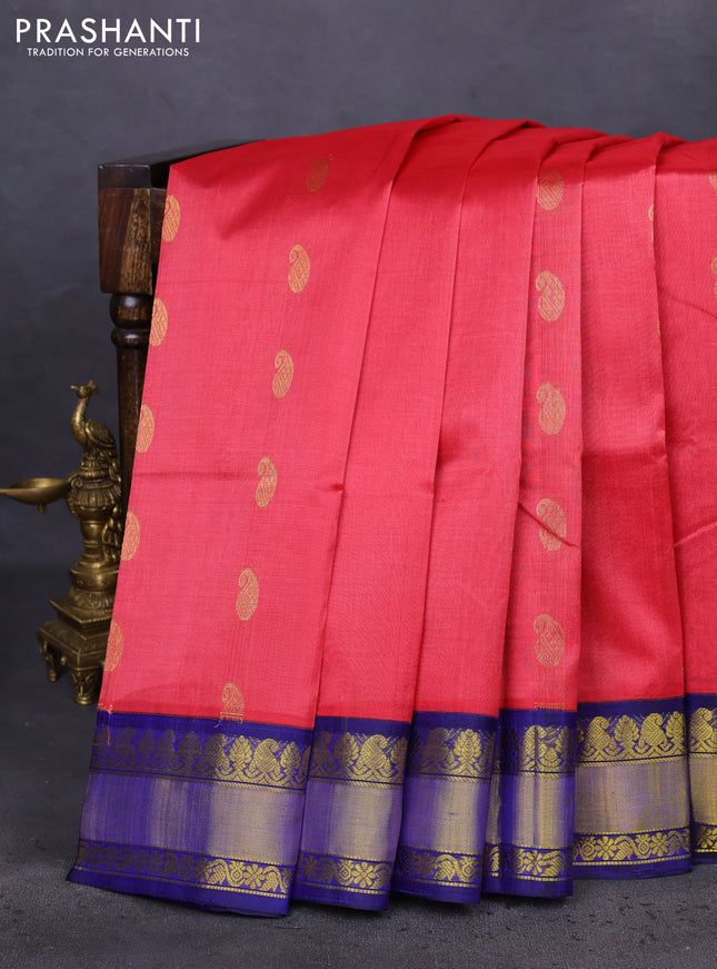 Kuppadam silk cotton saree tomato red and blue with paisley zari woven buttas and zari woven border
