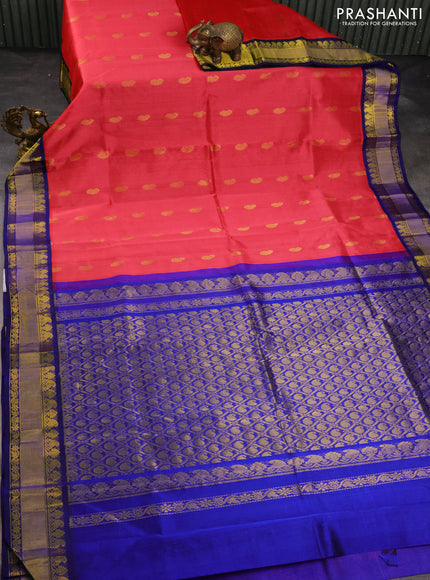 Kuppadam silk cotton saree tomato red and blue with paisley zari woven buttas and zari woven border