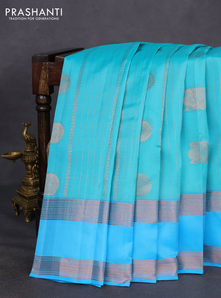 Kanchipuram silk saree teal blue and light blue with allover copper zari weaves & buttas and copper rettapet zari woven border