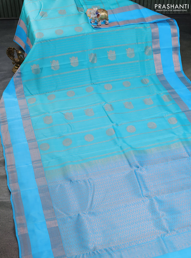 Kanchipuram silk saree teal blue and light blue with allover copper zari weaves & buttas and copper rettapet zari woven border
