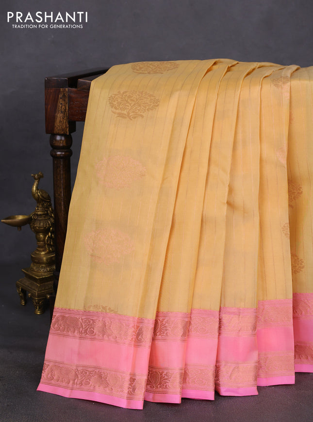 Kanchipuram silk saree pale yellow and light pink with allover copper zari weaves & buttas and copper rettapet zari woven border