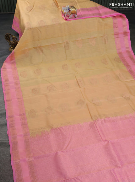 Kanchipuram silk saree pale yellow and light pink with allover copper zari weaves & buttas and copper rettapet zari woven border