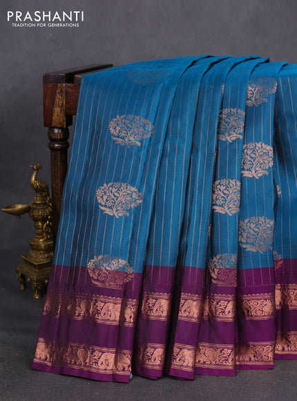 Kanchipuram silk saree peacock blue and purple with allover copper zari weaves & buttas and copper rettapet zari woven border