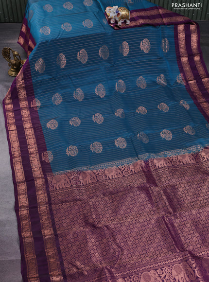 Kanchipuram silk saree peacock blue and purple with allover copper zari weaves & buttas and copper rettapet zari woven border