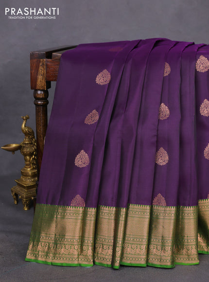 Kanchipuram silk saree deep violet and green with copper zari woven buttas and copper zari woven border