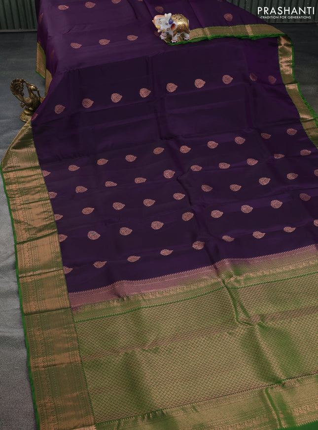Kanchipuram silk saree deep violet and green with copper zari woven buttas and copper zari woven border