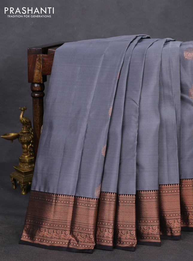Kanchipuram silk saree grey and black with copper zari woven buttas in borderless style