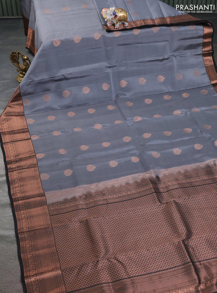 Kanchipuram silk saree grey and black with copper zari woven buttas in borderless style