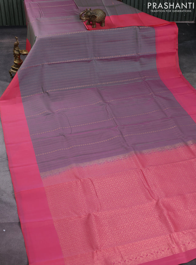 Kanchipuram silk saree dual shade of greenish pink and peach pink with allover copper zari weaves and simple border