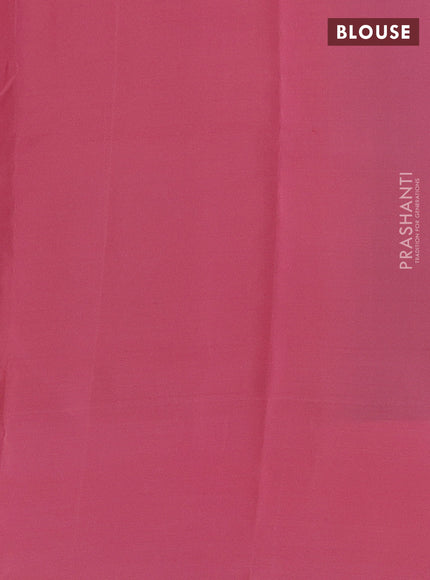 Kanchipuram silk saree dual shade of green and peach pink with allover copper zari weaves and simple border