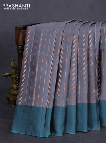 Kanchipuram silk saree grey and pasetel blue with allover copper zari weaves and simple border