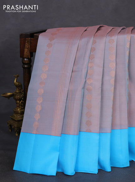 Kanchipuram silk saree dual shade of pastel pink and light blue with allover copper zari weaves and simple border