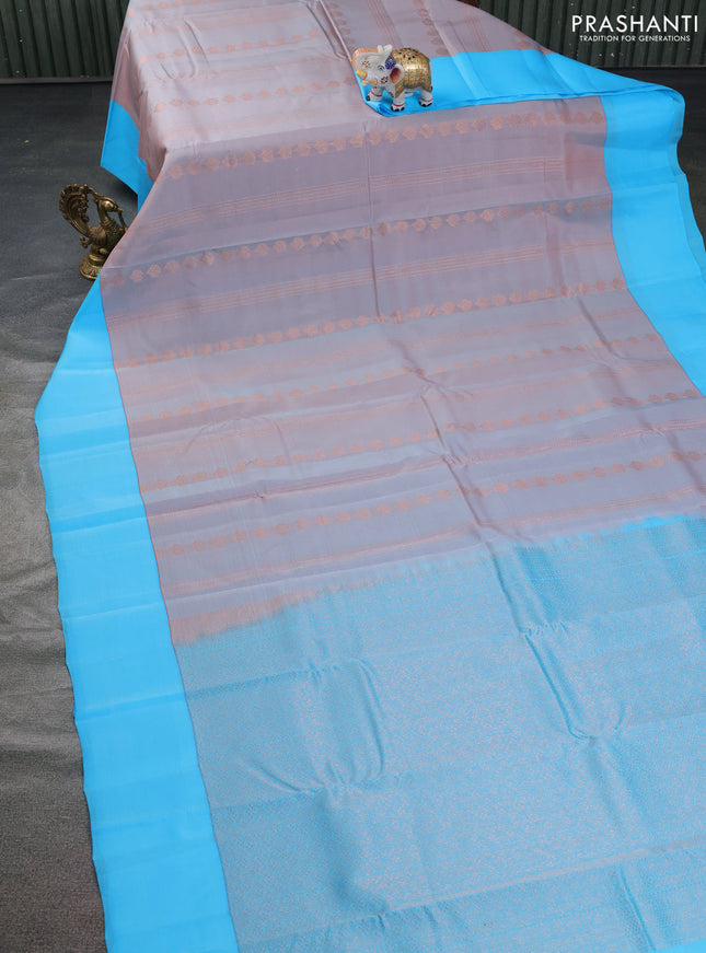 Kanchipuram silk saree dual shade of pastel pink and light blue with allover copper zari weaves and simple border