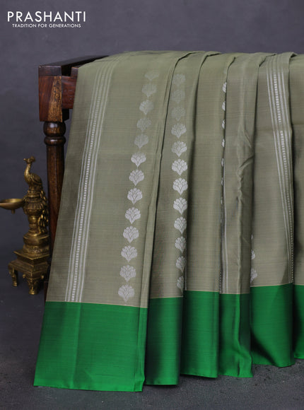 Kanchipuram silk saree elaichi green and green with allover silver zari weaves and simple border